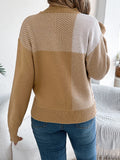Back view of a Color Block Striped Sweater with a round neck, showcasing the bold color block striped design in a cozy knit style.