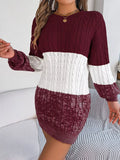 Woman wearing color block cable knit sweater dress with textured pattern, featuring basic style and slightly stretchy fabric.