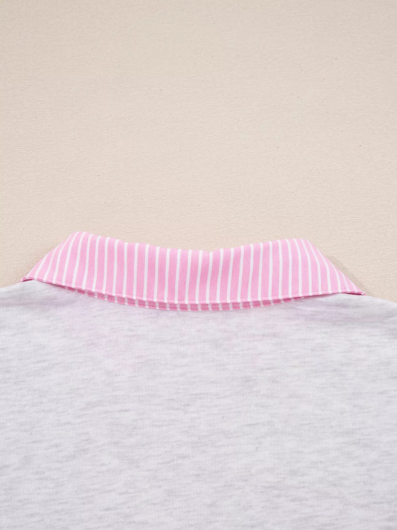 Frilled collar detail of the Contrasted Trim Pant Set's top in grey with pink stripes.