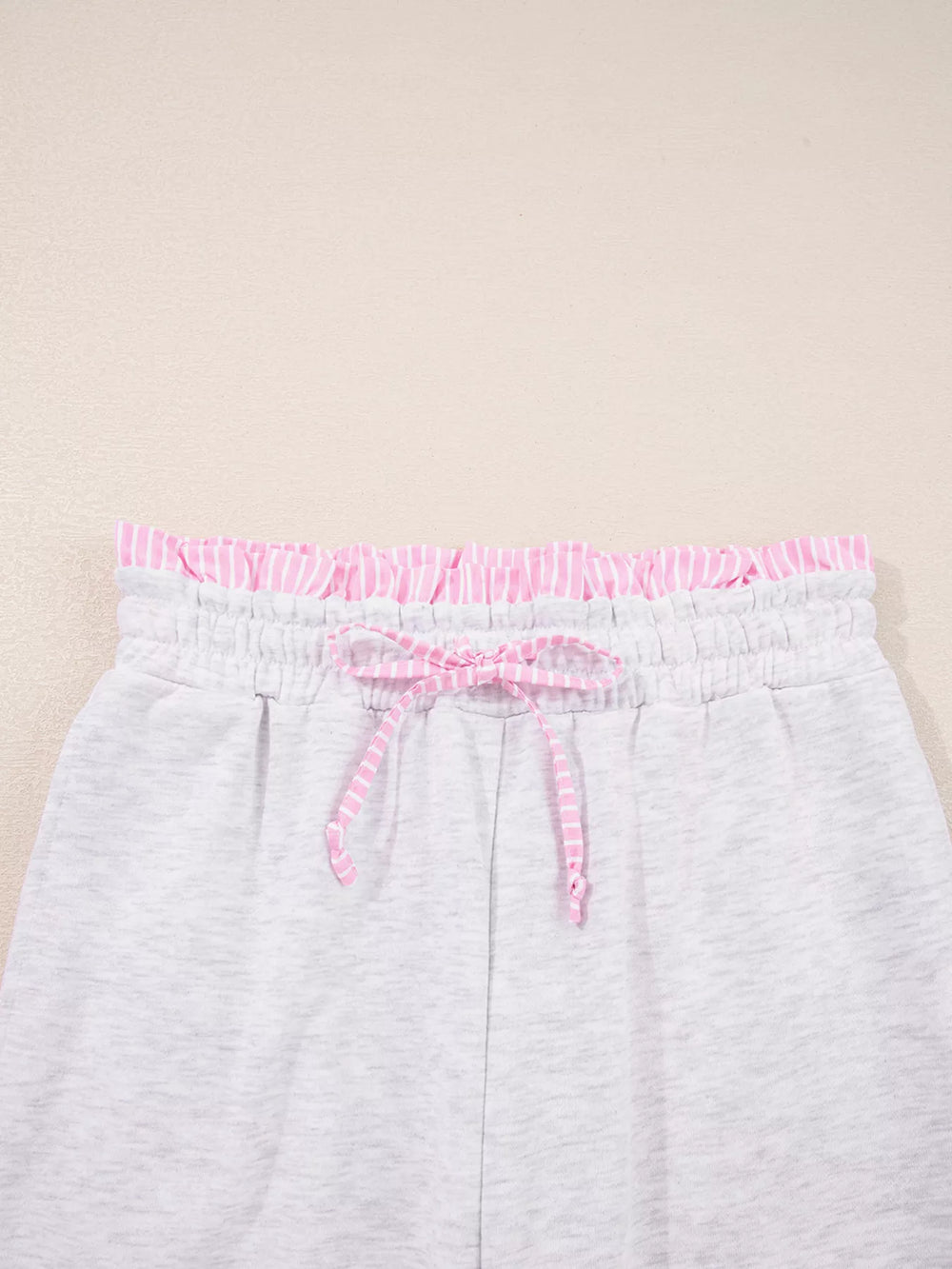 Contrasted Trim Pant Set drawstring detail with pink trim and elastic waistband.