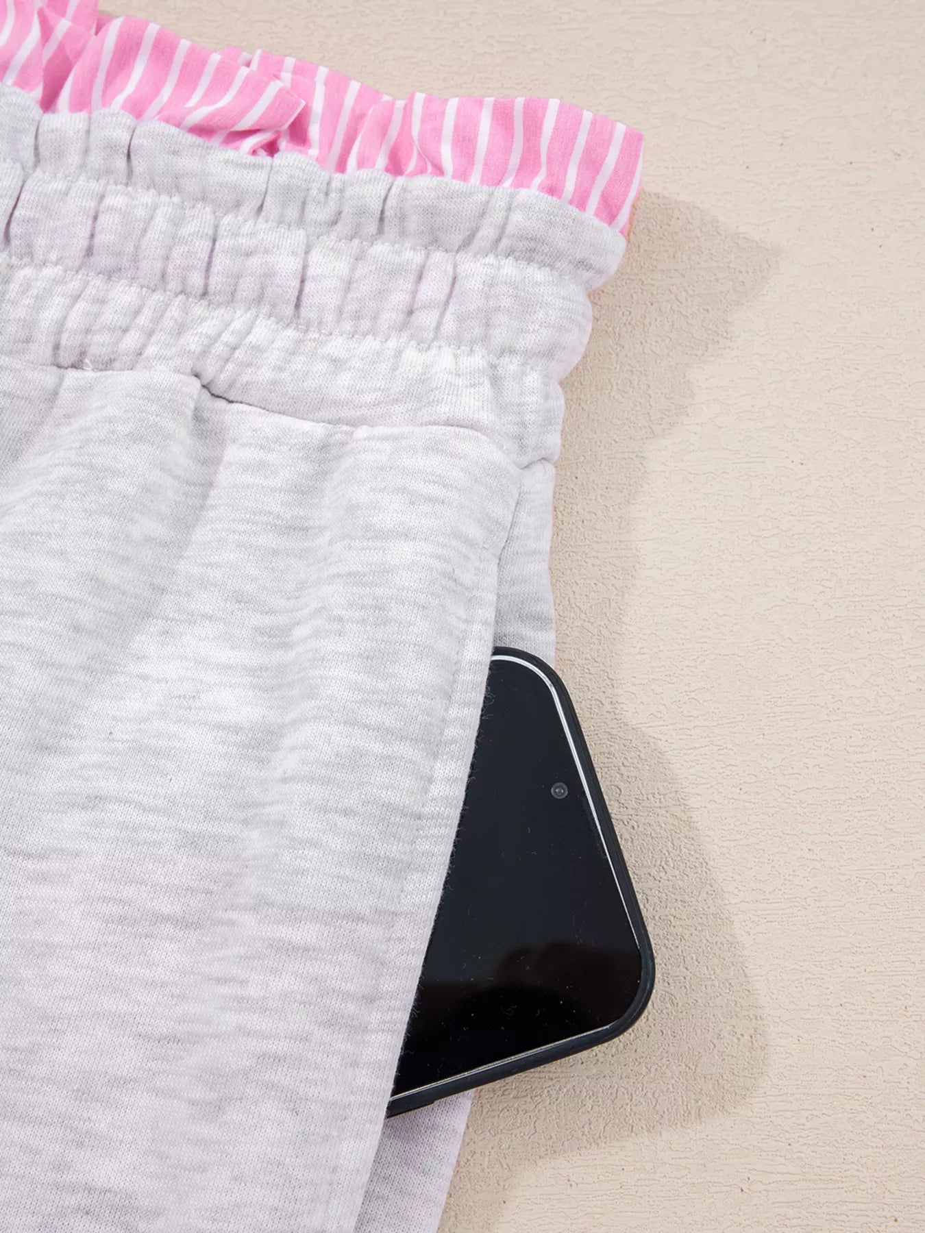 Close-up of Contrasted Trim Pant Set drawstring pants with phone pocket detail