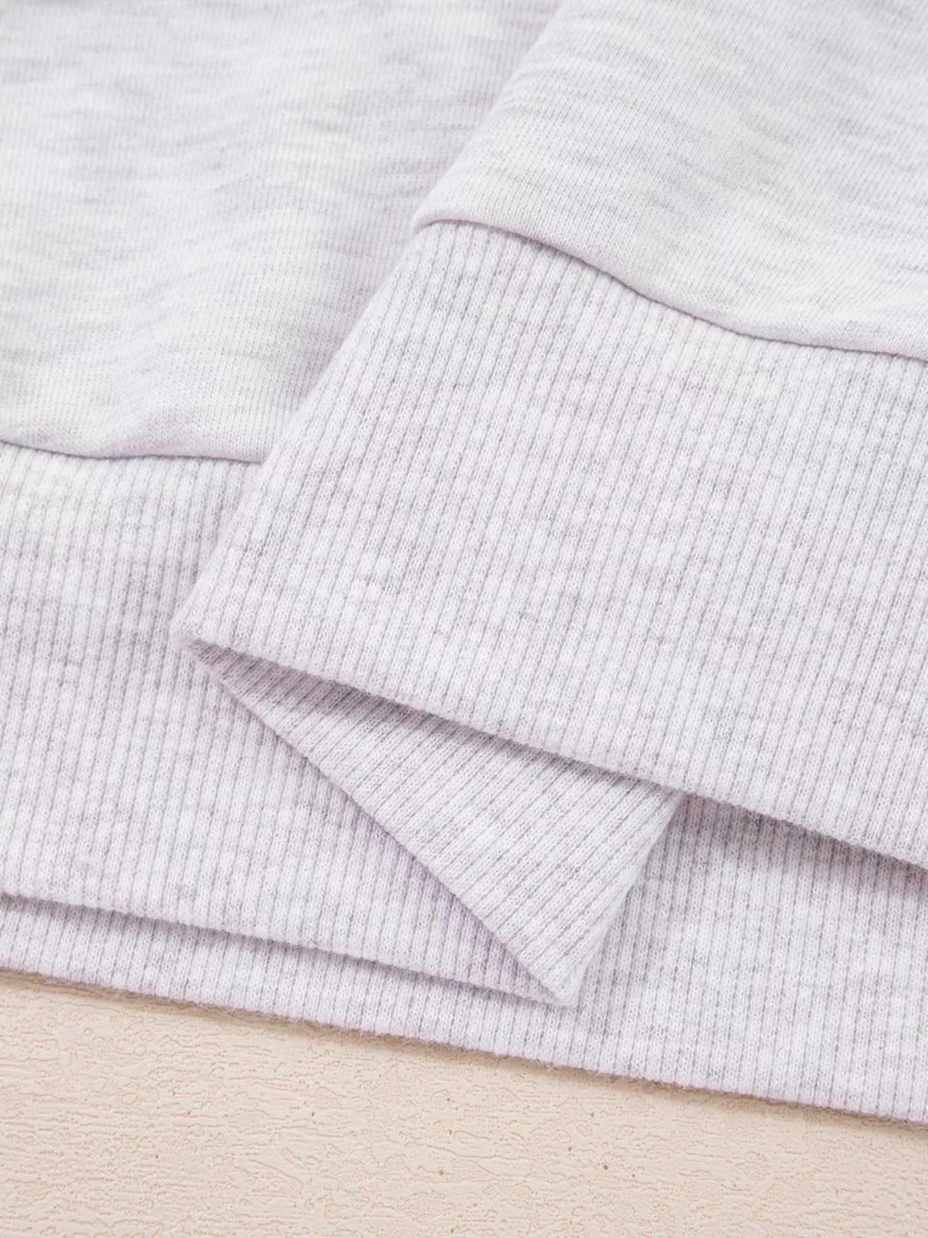 Close-up of Contrasted Trim Pant Set's frilled collar detail showcasing texture and fabric quality.