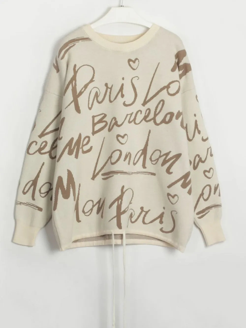 Letter Pattern Sweater with drawstring hem and dropped shoulder, featuring city names in a stylish print.