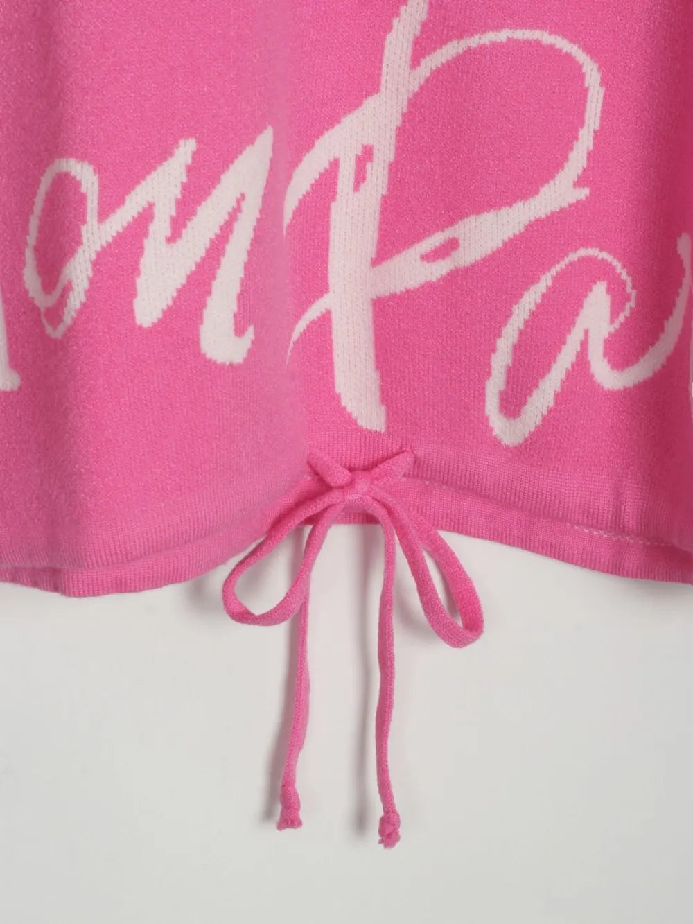 Letter Pattern Sweater with Drawstring Hem and Dropped Shoulder, showcasing unique design in pink with bold letters.