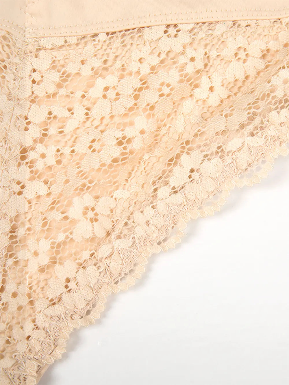 Close-up of Lace Detail Shaping Shorts showing elegant lace accents on smooth fabric.