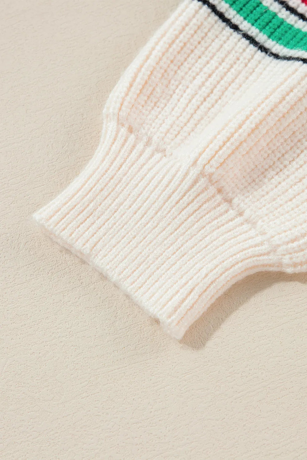 Close-up of the cuff detailing on the Letter Long Sleeve Sweater with round neckline and casual knit style.