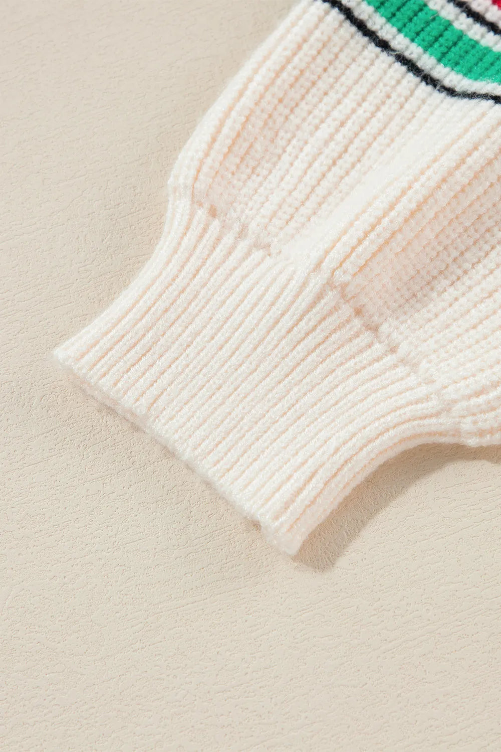Close-up of the cuff detailing on the Letter Long Sleeve Sweater with round neckline and casual knit style.