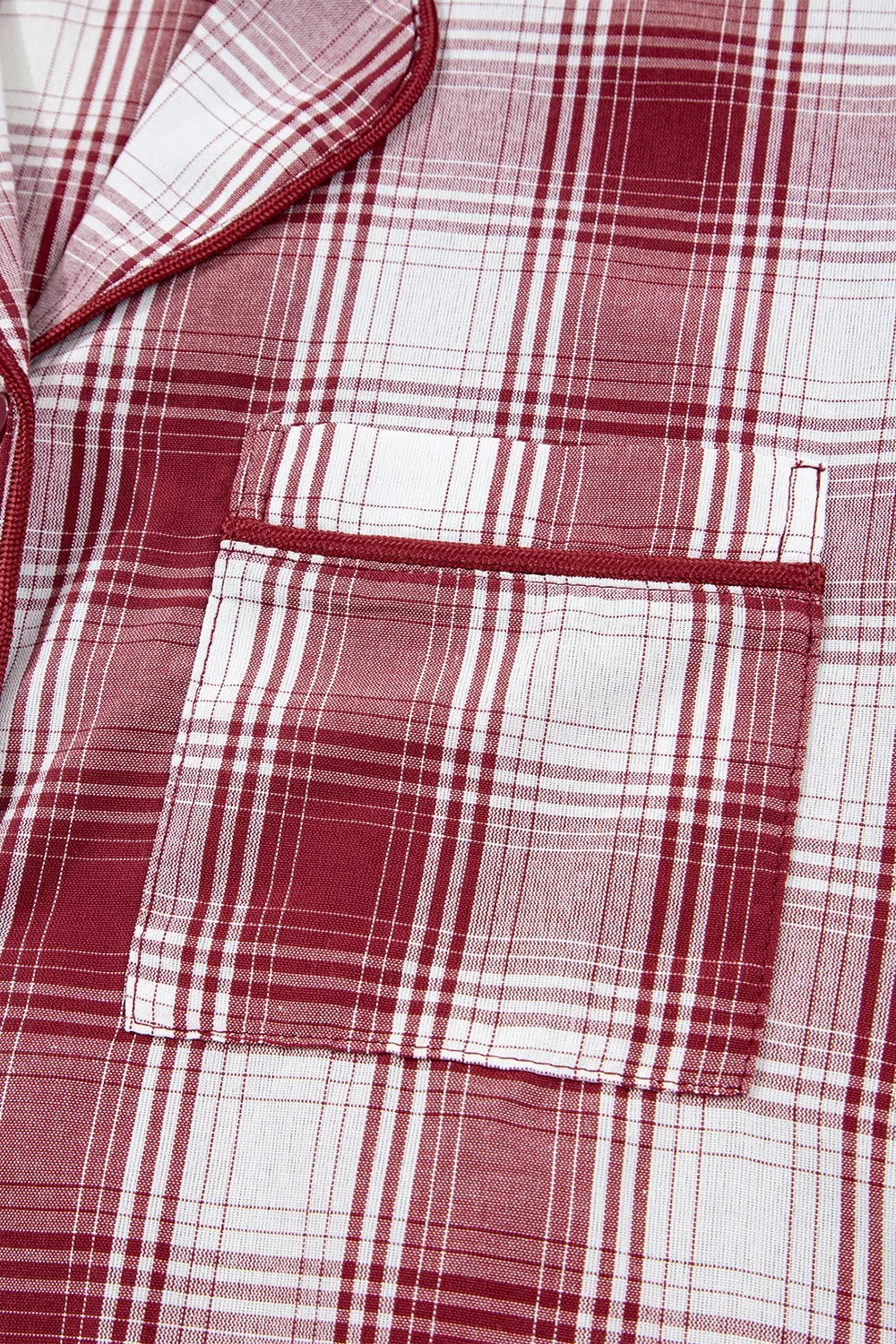 Close-up of pocket on Plaid Long Sleeve Shirt and Drawstring Shorts Lounge Set made of 100% cotton with no stretch.