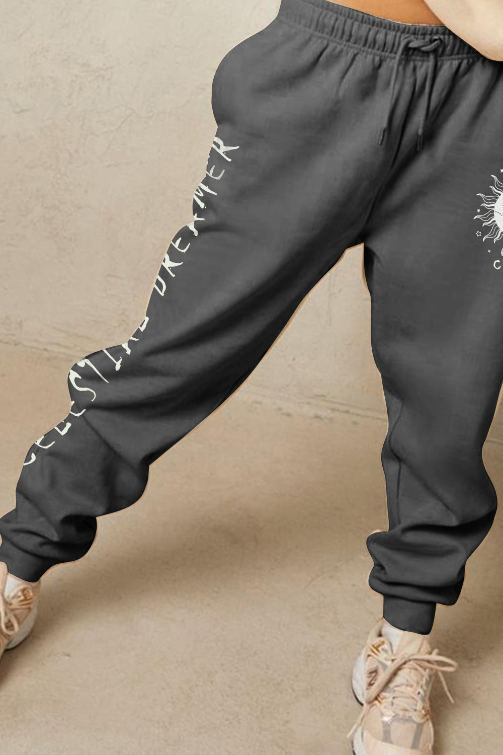 Graphic Sweatpants with CELESTIAL DREAMER print, full-size, comfortable cotton-poly blend for relaxed style and everyday wear.