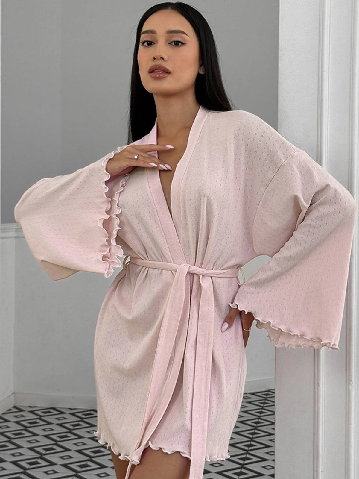 Woman wearing Tie Waist Lounge Nightgown with kimono sleeves, showcasing its elegant and comfortable design.