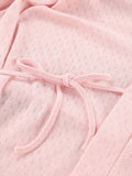 Close-up of pink Tie Waist Lounge Nightgown fabric with tie detail, showcasing kimono sleeve design for comfortable elegance.