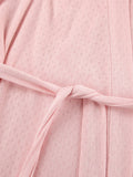 Close-up of pink Tie Waist Lounge Nightgown with textured fabric and elegant tie waist detail.