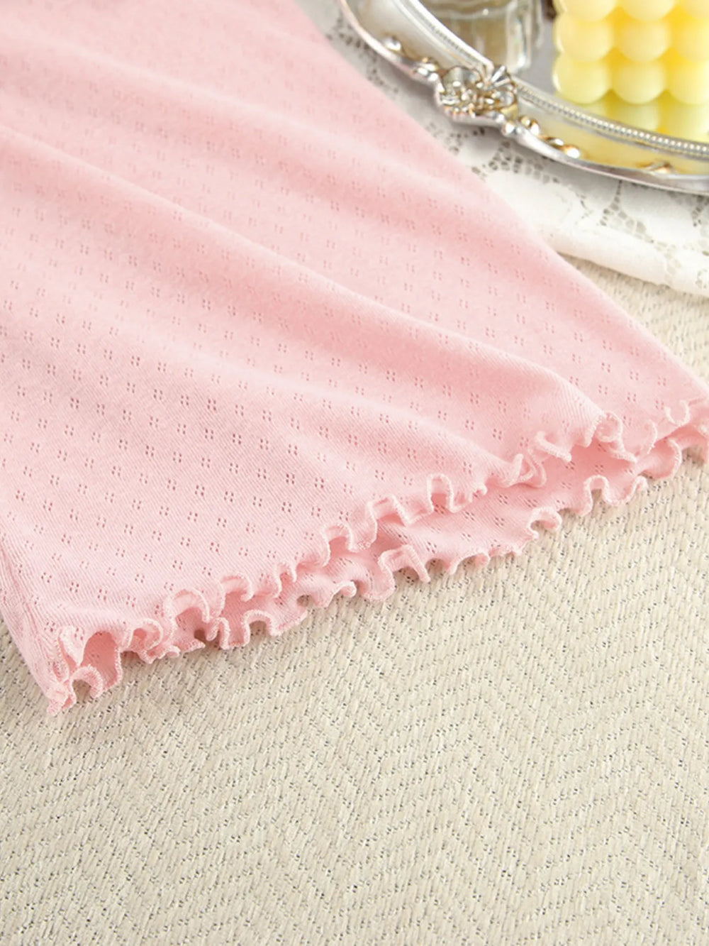 Close-up of pink fabric texture on Tie Waist Lounge Nightgown with kimono sleeve detail.