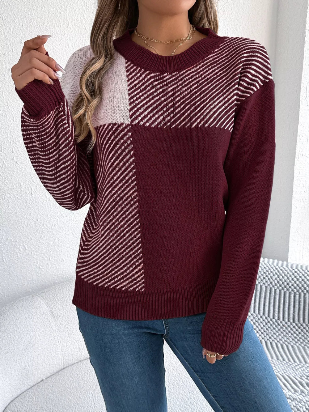 Color Block Striped Sweater – Round neck knit in maroon and white design, offering warmth and casual sophistication.
